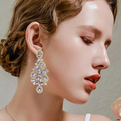 New fashion-forward, elegant, and luxurious European-style colored gemstone earrings with fine micro-pavé detailing